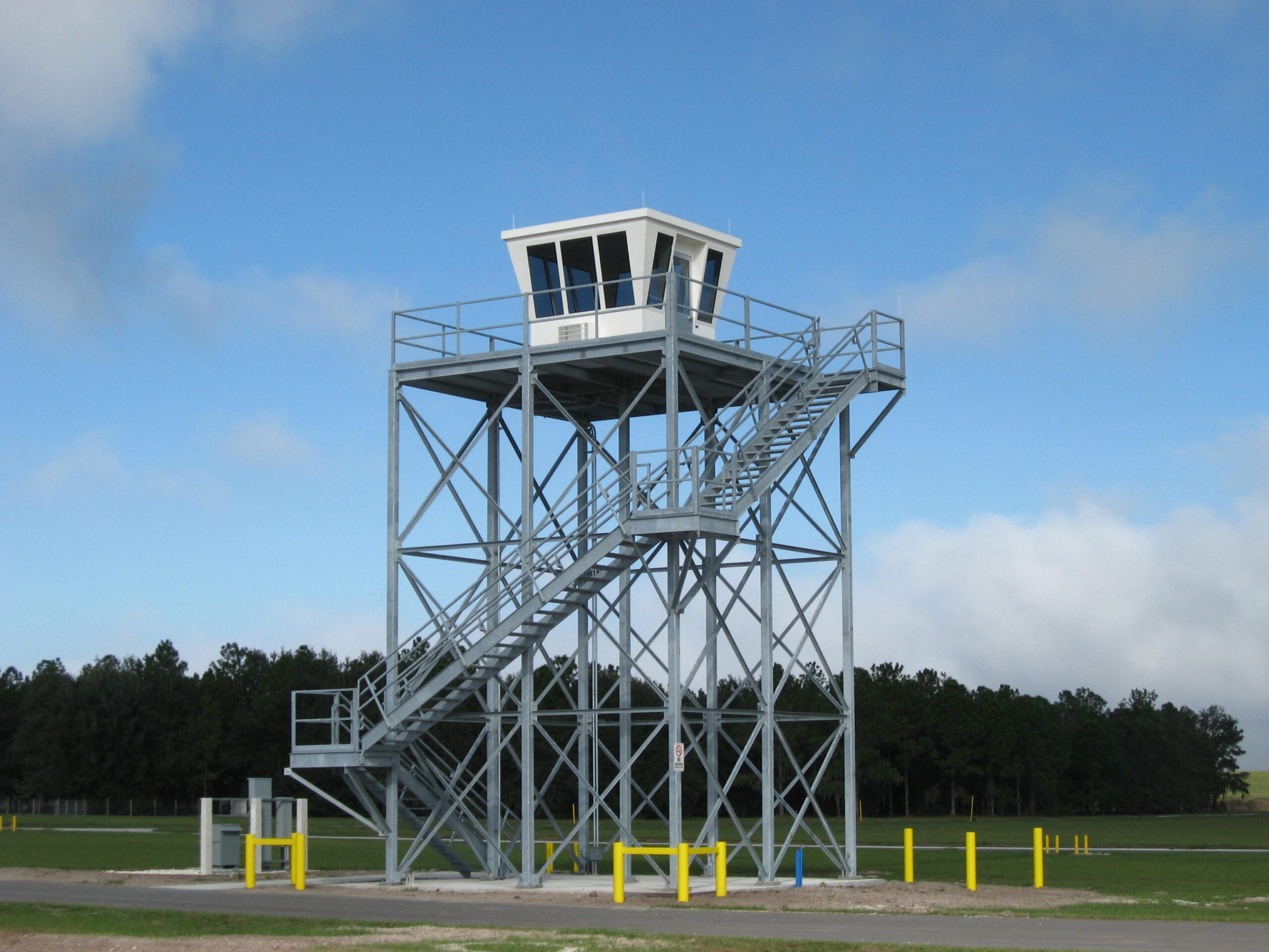 Tower with prefabricated building