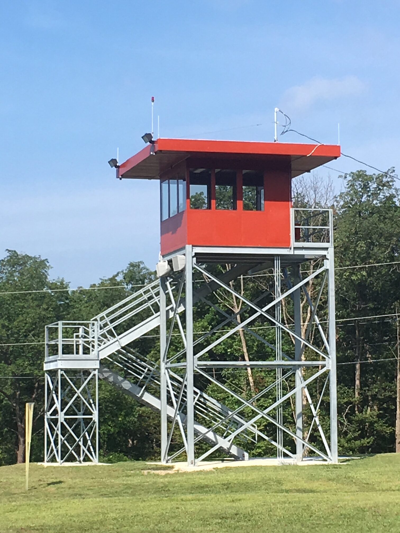 Tower with prefabricated building